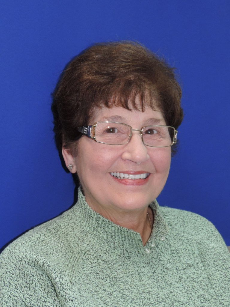an older woman with removable partial dentures