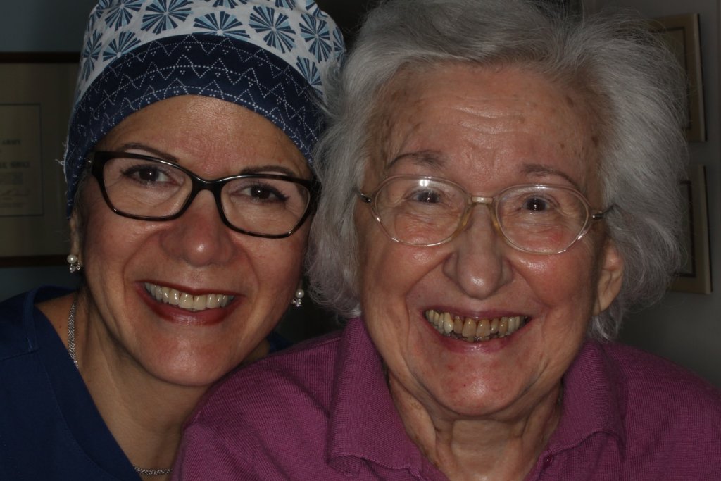 Dr. Elaine Torres-Melendez and a Nonagenarian missing only one tooth that has been replaced with a three unit bridge.