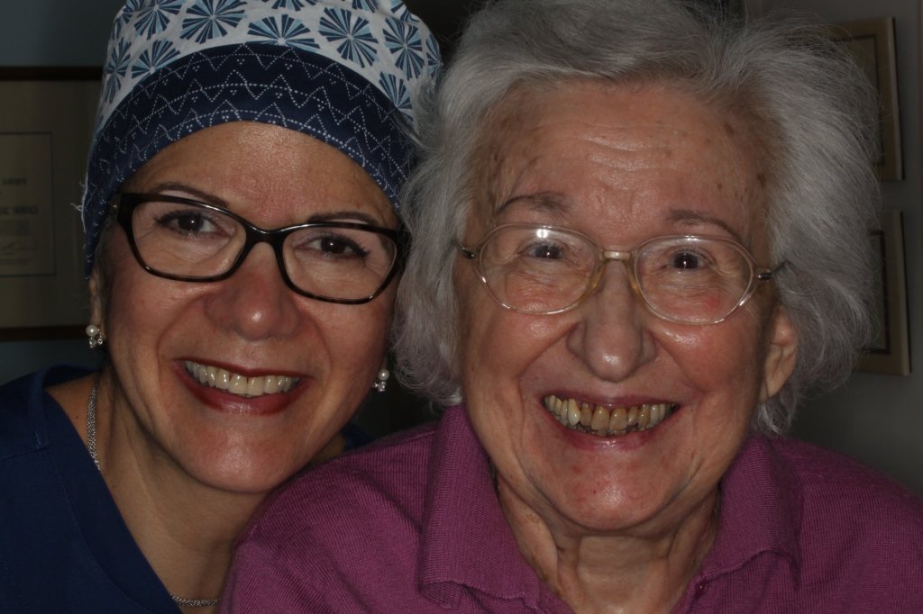 Dr. Elaine Torres-Melendez and a Nonagenarian missing only one tooth that has been replaced with a three unit bridge.