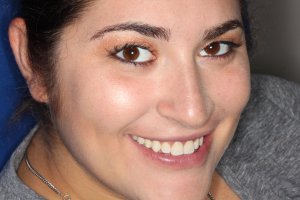 A young patient with a great smile thanks to dental crowns